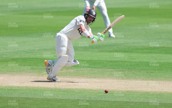 210626 - Glamorgan v Surrey, Rothesay County Championship Division 1- Rory Burns of Surrey plays a shot