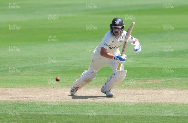 210626 - Glamorgan v Surrey, Rothesay County Championship Division 1- Ollie Pope of Surrey plays a shot