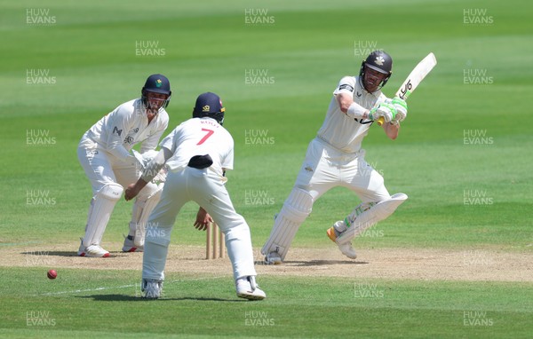 210626 - Glamorgan v Surrey, Rothesay County Championship Division 1- Rory Burns of Surrey plays a shot
