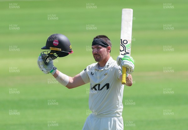210626 - Glamorgan v Surrey, Rothesay County Championship Division 1- Rory Burns of Surrey celebrates his 100