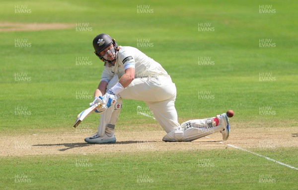 210626 - Glamorgan v Surrey, Rothesay County Championship Division 1- Ollie Pope of Surrey plays a shot