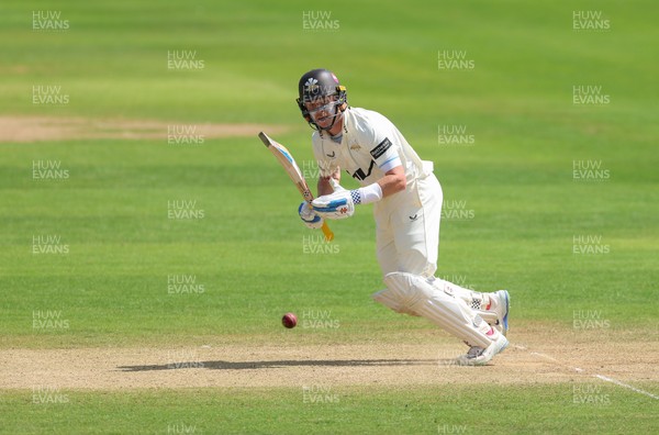 210626 - Glamorgan v Surrey, Rothesay County Championship Division 1- Ollie Pope of Surrey plays a shot