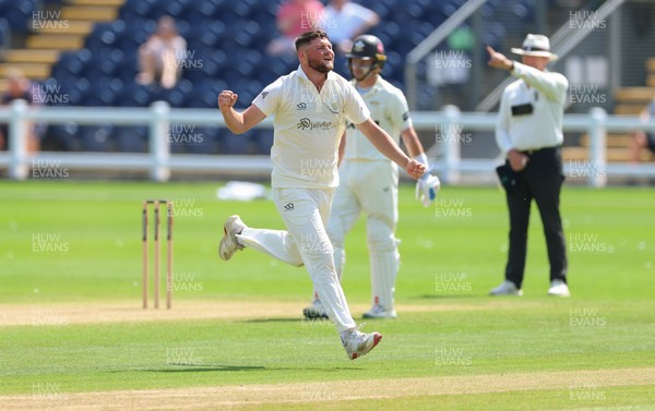 210626 - Glamorgan v Surrey, Rothesay County Championship Division 1- Tom Norton  of Glamorgan celebrates as he takes the wicket of Rory Burns of Surrey