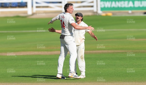 210626 - Glamorgan v Surrey, Rothesay County Championship Division 1- Ryan Hadley of Glamorgan celebrates after taking the wicket of Adam Thomas of Surrey