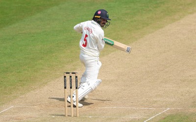 220626 - Glamorgan v Surrey, Rothesay County Championship Division 1- Kiran Carlson of Glamorgan plays a shot