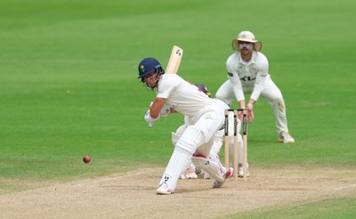 220626 - Glamorgan v Surrey, Rothesay County Championship Division 1- Asa Tribe of Glamorgan plays a shot