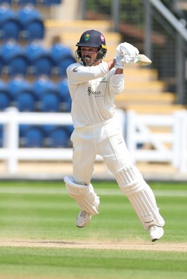 220626 - Glamorgan v Surrey, Rothesay County Championship Division 1- Kiran Carlson of Glamorgan plays a shot