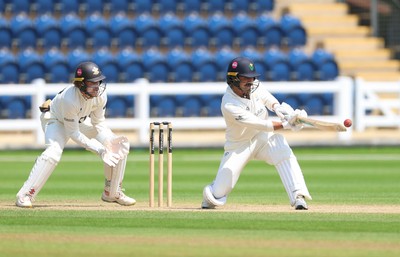 220626 - Glamorgan v Surrey, Rothesay County Championship Division 1- Kiran Carlson of Glamorgan plays a shot