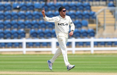 220626 - Glamorgan v Surrey, Rothesay County Championship Division 1- Rahul Chahar of Surrey celebrates taking the wicket of Asa Tribe of Glamorgan