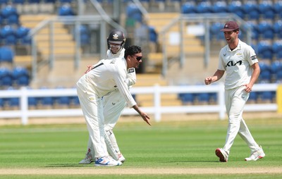 220626 - Glamorgan v Surrey, Rothesay County Championship Division 1- Rahul Chahar of Surrey celebrates taking the wicket of Asa Tribe of Glamorgan