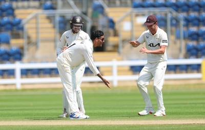 220626 - Glamorgan v Surrey, Rothesay County Championship Division 1- Rahul Chahar of Surrey celebrates taking the wicket of Asa Tribe of Glamorgan