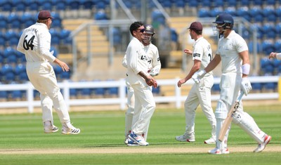 220626 - Glamorgan v Surrey, Rothesay County Championship Division 1- Rahul Chahar of Surrey celebrates taking the wicket of Asa Tribe of Glamorgan