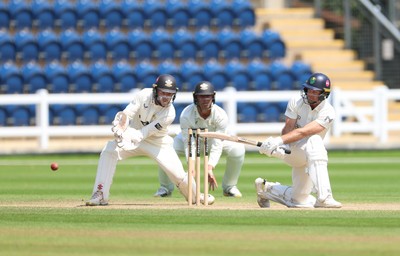 220626 - Glamorgan v Surrey, Rothesay County Championship Division 1- Colin Ingram of Glamorgan plays a shot