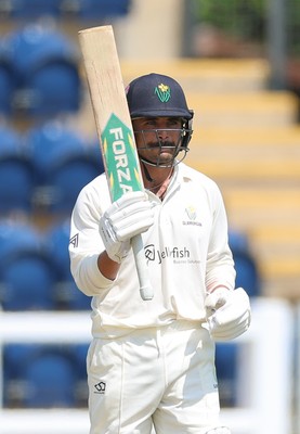 220626 - Glamorgan v Surrey, Rothesay County Championship Division 1- Kiran Carlson of Glamorgan celebrates his 50