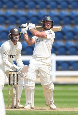 220626 - Glamorgan v Surrey, Rothesay County Championship Division 1- Colin Ingram of Glamorgan hits a 6