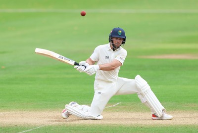 220626 - Glamorgan v Surrey, Rothesay County Championship Division 1- Sean Dickson of Glamorgan hits a four
