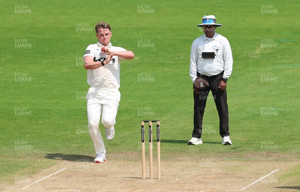220626 - Glamorgan v Surrey, Rothesay County Championship Division 1- Sam Curran of Surrey bowls during the final day