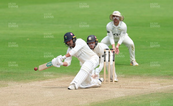 220626 - Glamorgan v Surrey, Rothesay County Championship Division 1- Kiran Carlson of Glamorgan plays a shot