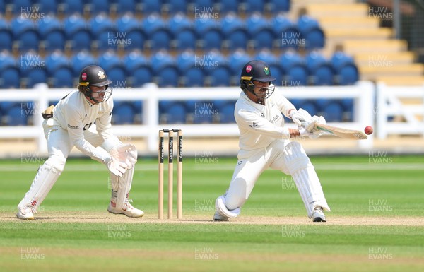 220626 - Glamorgan v Surrey, Rothesay County Championship Division 1- Kiran Carlson of Glamorgan plays a shot
