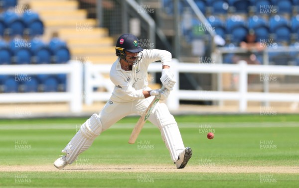 220626 - Glamorgan v Surrey, Rothesay County Championship Division 1- Kiran Carlson of Glamorgan plays a shot