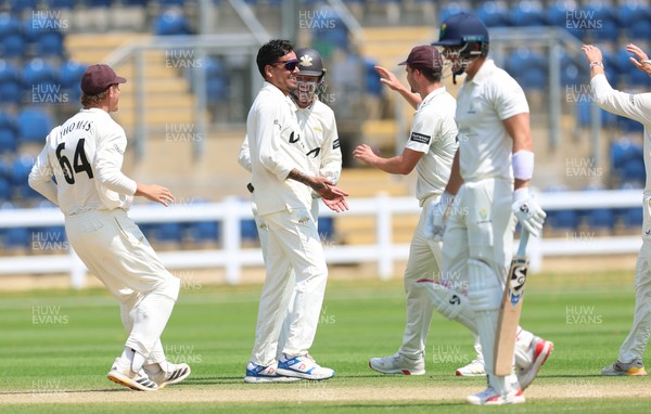 220626 - Glamorgan v Surrey, Rothesay County Championship Division 1- Rahul Chahar of Surrey celebrates taking the wicket of Asa Tribe of Glamorgan