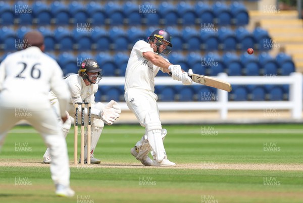 220626 - Glamorgan v Surrey, Rothesay County Championship Division 1- Colin Ingram of Glamorgan hits a 6