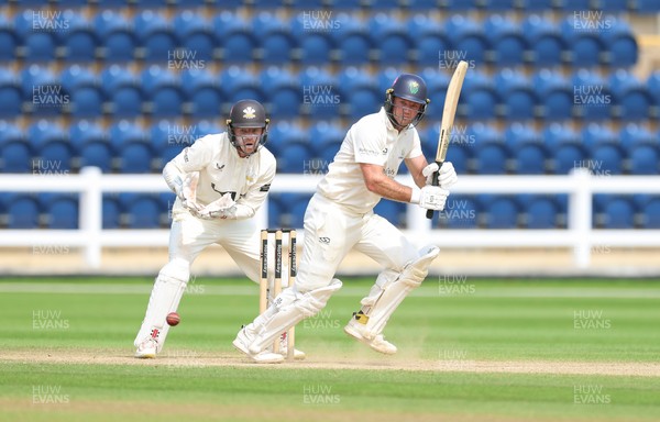 220626 - Glamorgan v Surrey, Rothesay County Championship Division 1- Colin Ingram of Glamorgan plays a shot