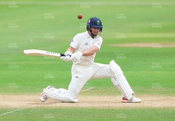 220626 - Glamorgan v Surrey, Rothesay County Championship Division 1- Sean Dickson of Glamorgan hits a four