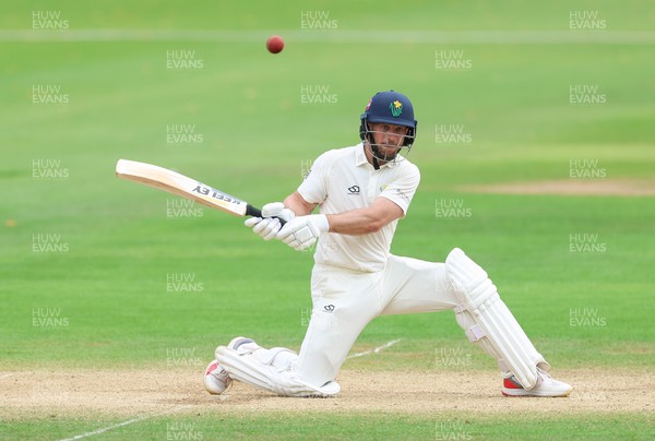 220626 - Glamorgan v Surrey, Rothesay County Championship Division 1- Sean Dickson of Glamorgan hits a four