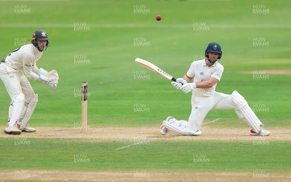 220626 - Glamorgan v Surrey, Rothesay County Championship Division 1- Sean Dickson of Glamorgan hits a four