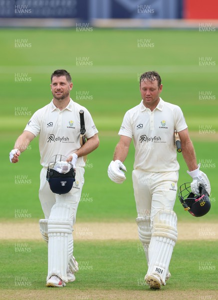 220626 - Glamorgan v Surrey, Rothesay County Championship Division 1- Sean Dickson of Glamorgan and Colin Ingram of Glamorgan celebrate the win over Surrey
