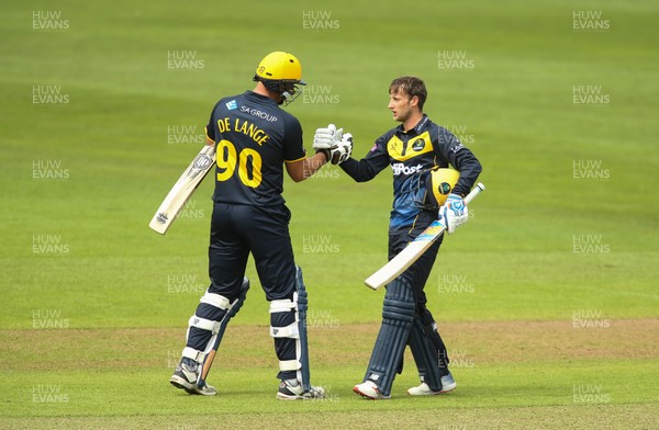 280419 - Glamorgan v Surrey, Royal London One Day Cup - Billy Root of Glamorgan is congratulated by Marchant de Lange of Glamorgan after reaching his 100
