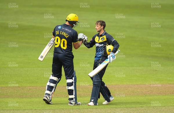 280419 - Glamorgan v Surrey, Royal London One Day Cup - Billy Root of Glamorgan is congratulated by Marchant de Lange of Glamorgan after reaching his 100