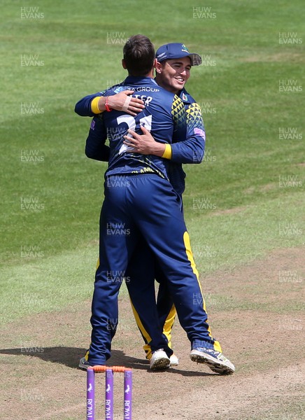 010618 - Glamorgan v Sussex - Royal London One Day Cup - Andrew Salter celebrates with Kiran Carlson of Glamorgan after bowling Harry Finch for LBW