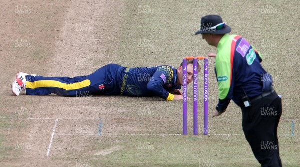 010618 - Glamorgan v Sussex - Royal London One Day Cup - Colin Ingram of Glamorgan lets a ball slip through his finger tips