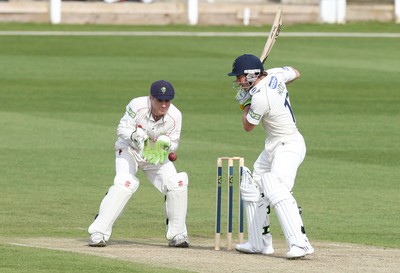 09.04.10 ... Glamorgan v Sussex, LV County Championship, SWALEC Stadium, Cardiff -  Glamorgans wicket-keeper Mark Wallace collects the ball as Sussex' s Andrew Hodd looks on 