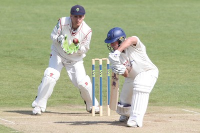 11.04.10 ... Glamorgan v Sussex, LV County Championship, SWALEC Stadium, Cardiff -  Glamorgan's Mark Wallace takes the ball as Sussex's Murray Goodwin leaves 