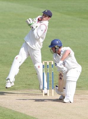 11.04.10 ... Glamorgan v Sussex, LV County Championship, SWALEC Stadium, Cardiff -  Glamorgan's Mark Wallace takes the ball as Sussex's Murray Goodwin leaves 