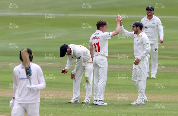 130622 - Glamorgan v Sussex - LV= County Championship - Division Two - Andrew Gorvin celebrates with Andrew Salter after Henry Crocombe is caught by Colin Ingram