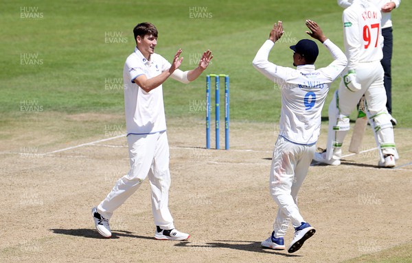 140622 - Glamorgan v Sussex - LV= County Championship - Division Two - Henry Crocombe celebrates after Colin Ingram of Glamorgan is caught by Tom Alsop of Sussex