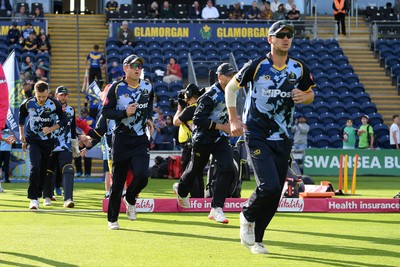 140625 - Glamorgan v Sussex - Vitality Blast - Glamorgan players run out for the start of the match