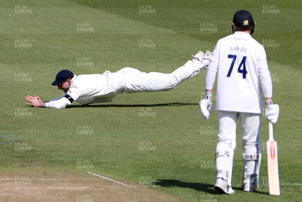 160421 - Glamorgan v Sussex - LV= County Championship - James Weighell of Glamorgan catches Tom Clark of Sussex