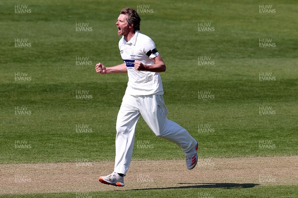 180421 - Glamorgan v Sussex - LV= County Championship - Michael Hogan of Glamorgan celebrates after Tom Haines is caught by Andrew Balbirnie