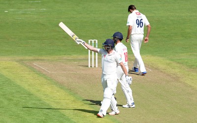 230816 - Glamorgan v Sussex - Specsavers County Championship -Graham Wagg of Glamorgan celebrates his half century