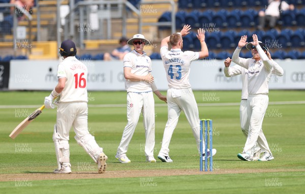 250623 - Glamorgan v Sussex, LV= Insurance County Championship, Div 2 - Nathan McAndrew of Sussex celebrates taking the wicket of Sam Northeast of Glamorgan
