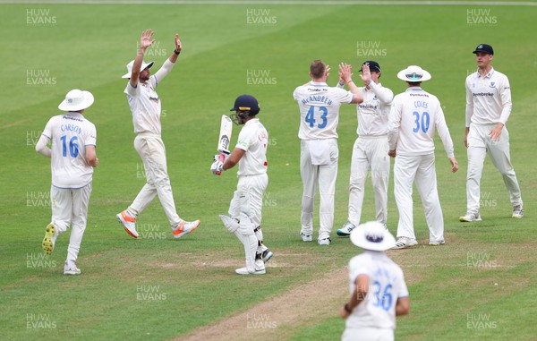 250623 - Glamorgan v Sussex, LV= Insurance County Championship, Div 2 - Nathan McAndrew of Sussex celebrates taking the wicket of Kiran Carlson of Glamorgan