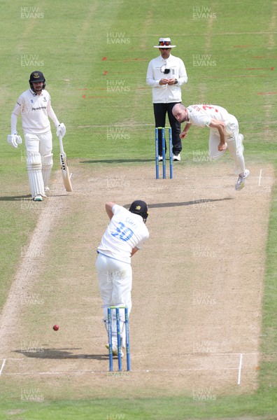 250623 - Glamorgan v Sussex, LV= Insurance County Championship, Div 2 - Jamie McIlroy of Glamorgan bowls to James Coles of Sussex