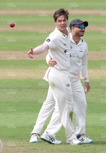250623 - Glamorgan v Sussex, LV= Insurance County Championship, Div 2 - Mitchell Swepson of Glamorgan celebrates after he takes the wicket of Nathan McAndrew of Sussex