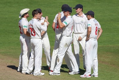 260816 - Glamorgan v Sussex, Specsavers County Championship, Division 2 - Owen Morgan of Glamorgan celebrates with team mates after taking the wicket of Luke Wells of Sussex