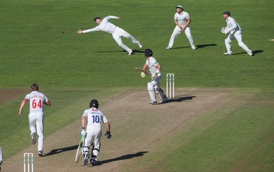 260816 - Glamorgan v Sussex, Specsavers County Championship, Division 2 - Aneurin Donald of Glamorgan dives for the ball but fails to make the catch off the bat of Chris Nash of Sussex